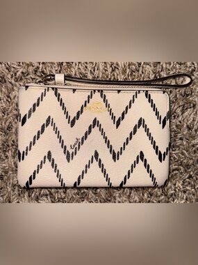 COACH Cream Leather Wristlet with Black Zigzag Print and Gold Logo